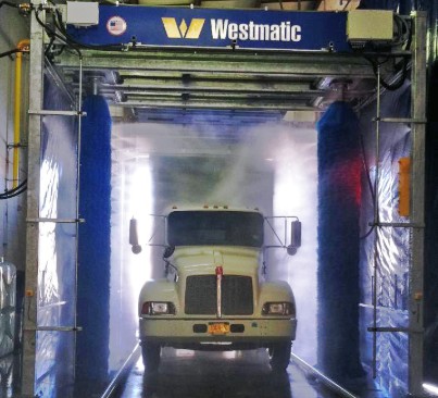 Hybrid Drive-Through Vehicle Wash System